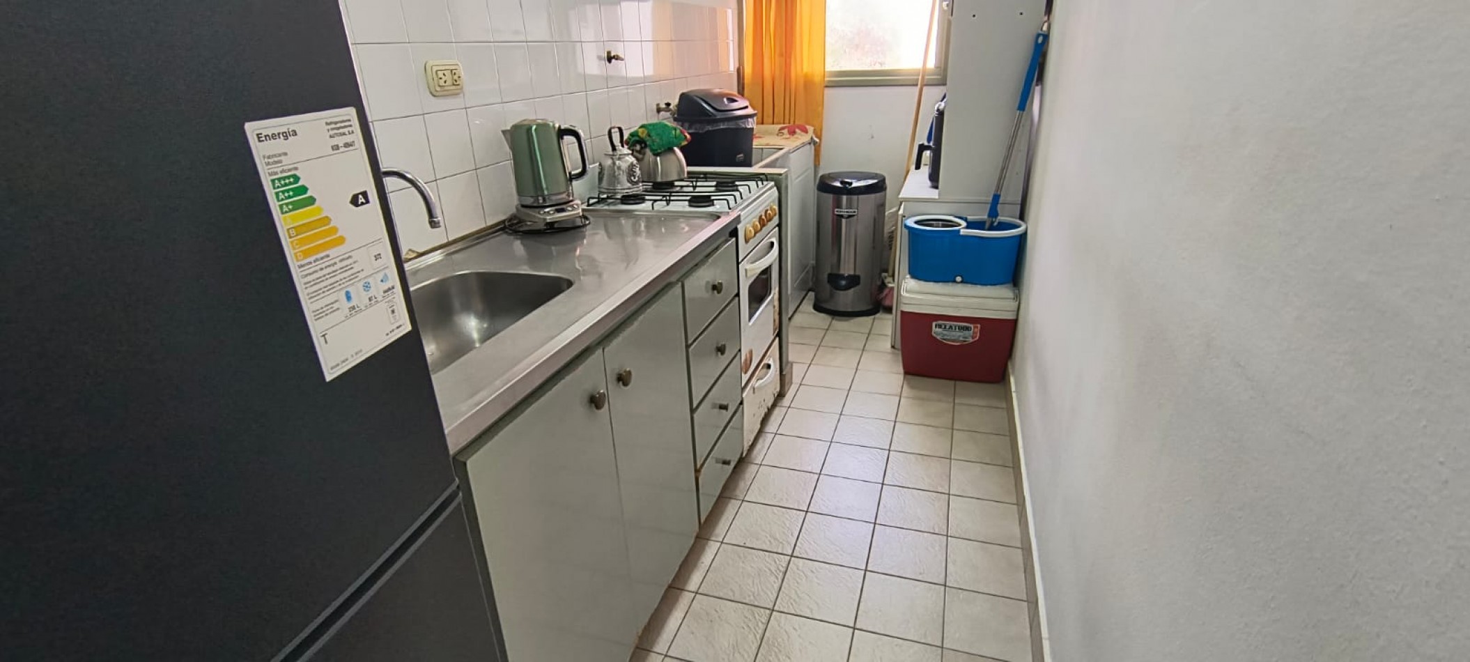 Venta Departamento tres ambientes con cochera descubierta