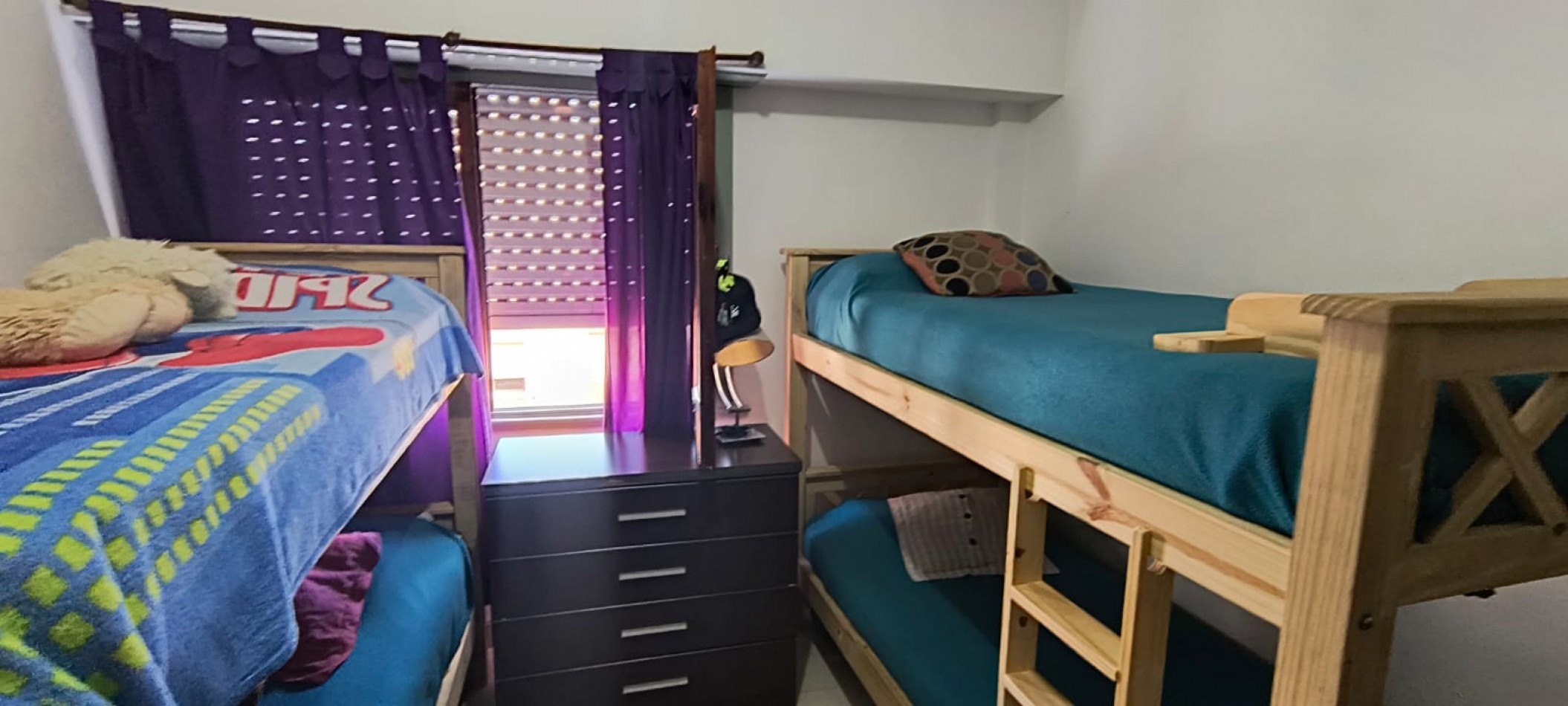 Venta Departamento tres ambientes con cochera descubierta