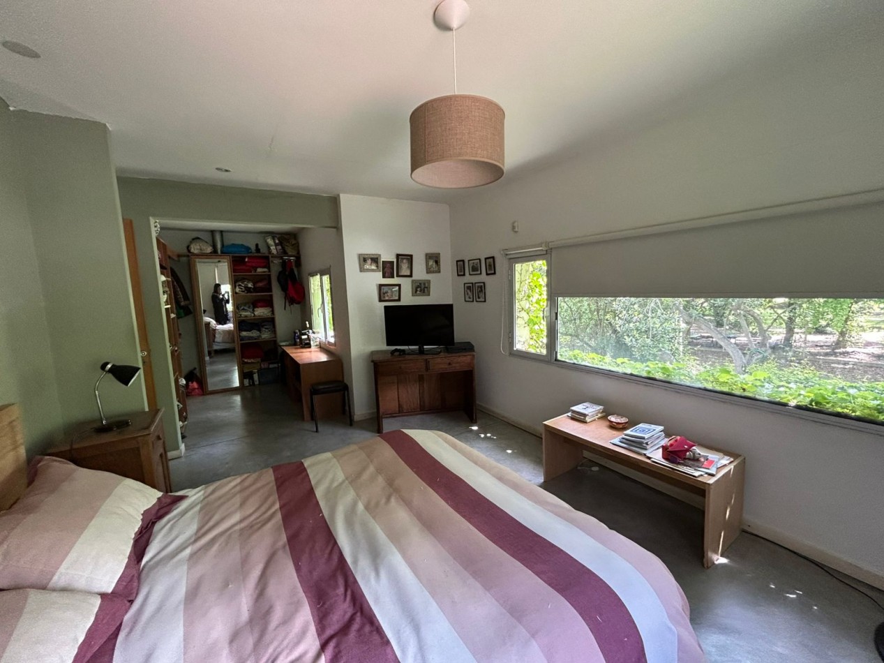 CASA EN PH TOTALMENTE INDEPENDIENTE 4 AMBIENTES CON ESCRITORIO QUINCHO CUBIERTO Y PARQUE .APTO CREDITO