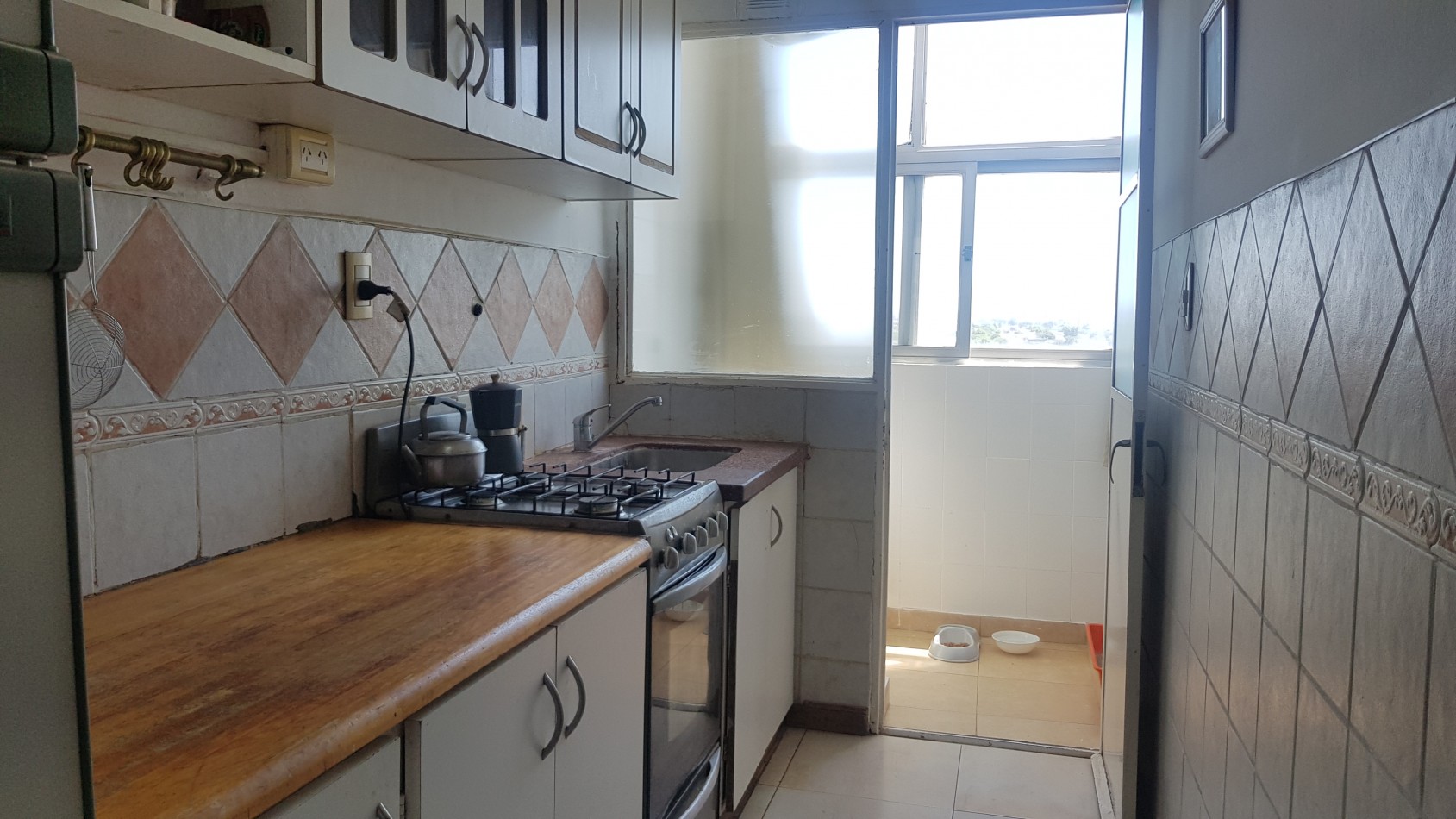 Tres ambientes con balcon saliente vista abierta