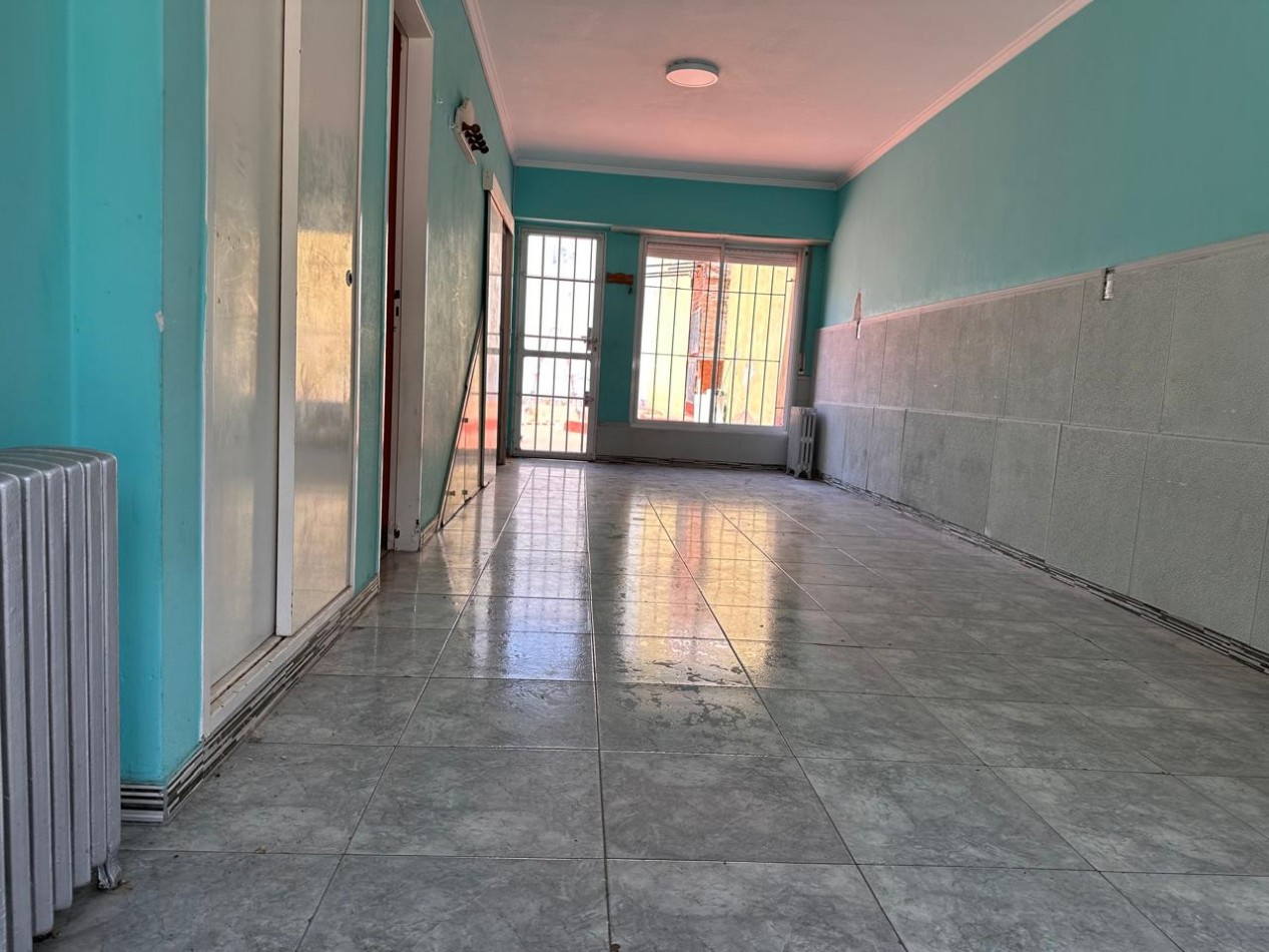 VENTA CASA 5 AMBIENTES CALEFACCION CENTRAL BARRIO PERLA NORTE