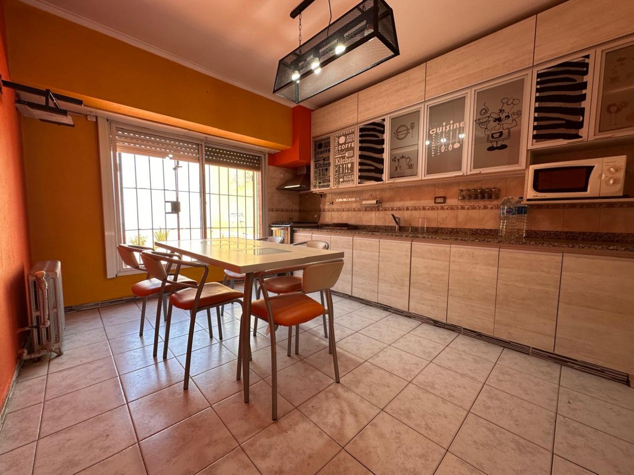 VENTA CASA 5 AMBIENTES CALEFACCION CENTRAL BARRIO PERLA NORTE