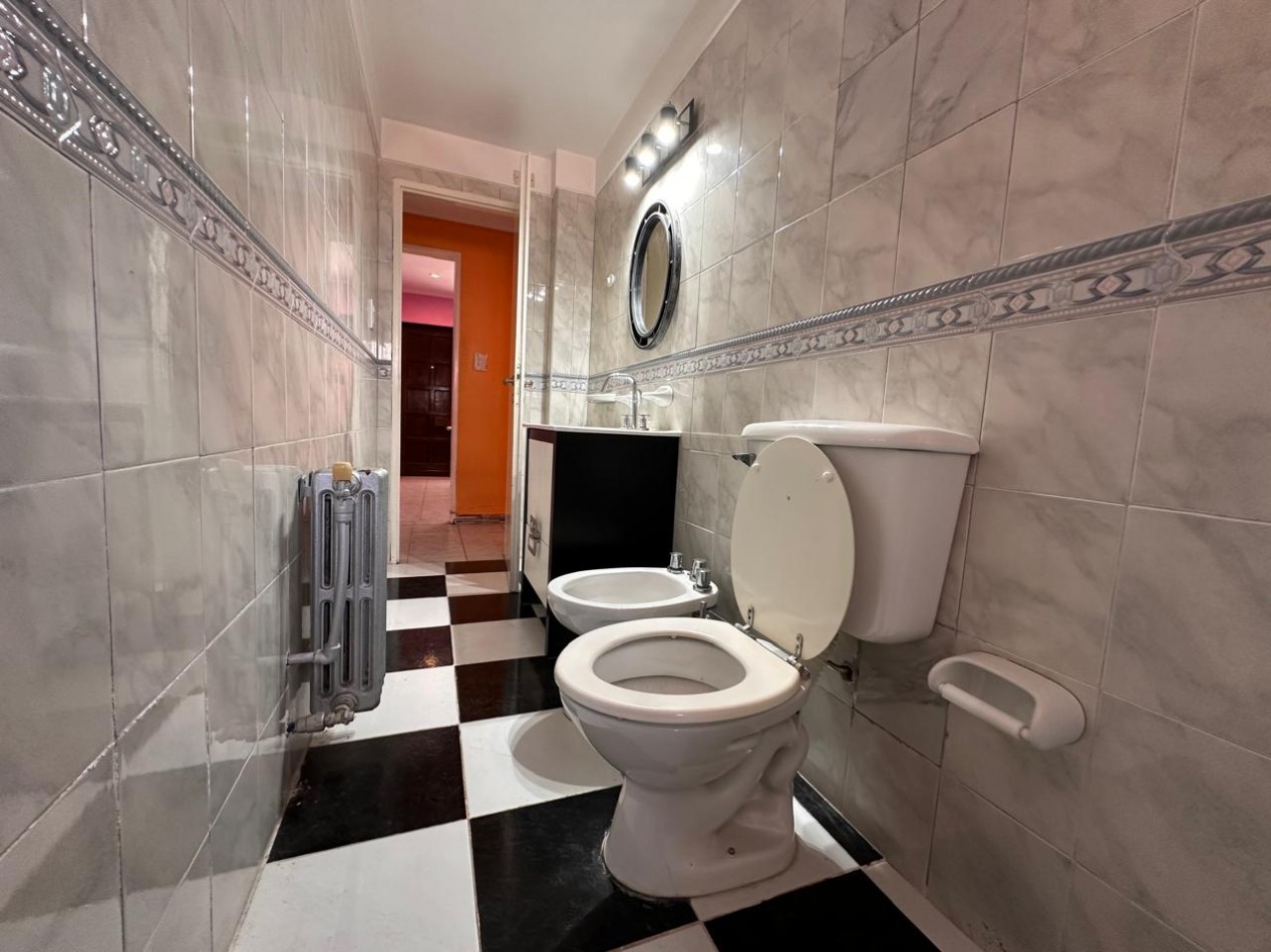 VENTA CASA 5 AMBIENTES CALEFACCION CENTRAL BARRIO PERLA NORTE