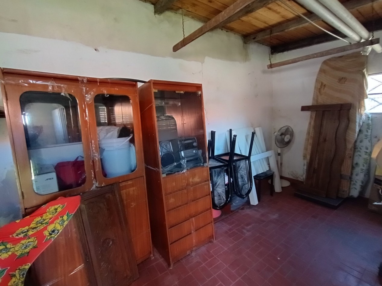 Venta casa 3 ambientes + departamento 2 ambientes con garage y jardin apto credito